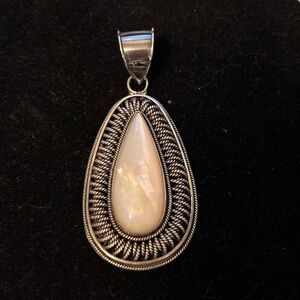 Artisan Sterling silver stamped mother of pearl pendant